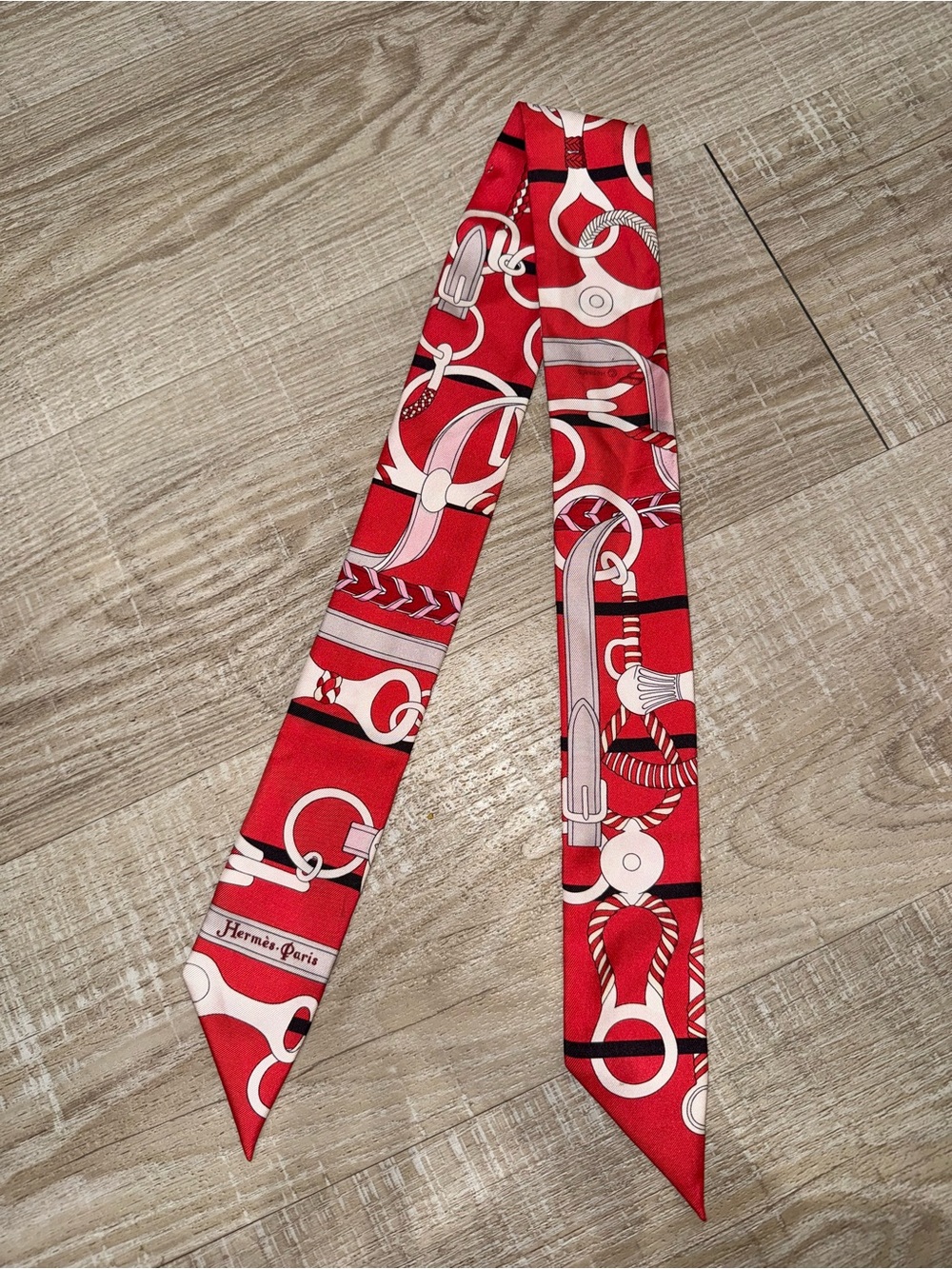 Hermès Red Silk Twilly with White and Pink Harness Motif - Picture 2 of 3